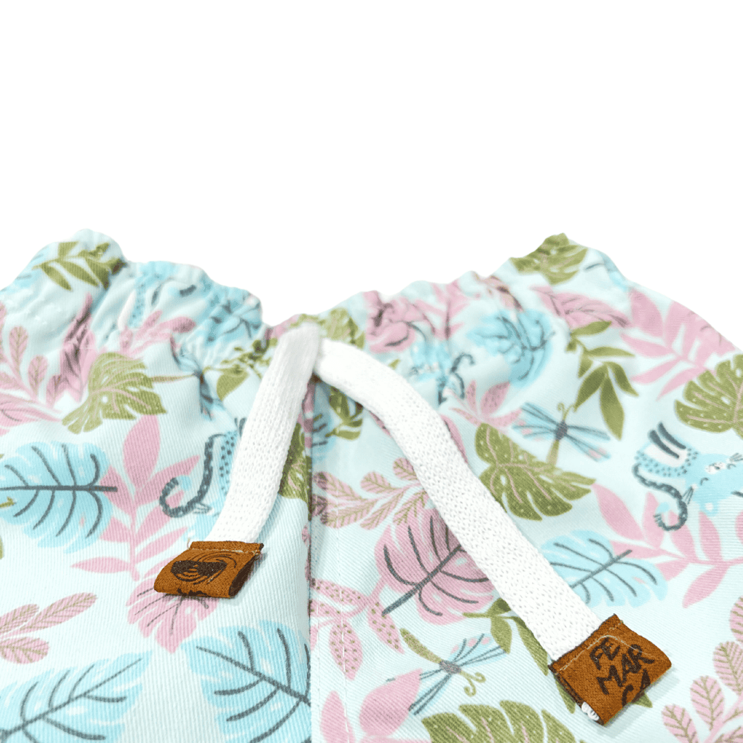 OUT|Short Niña hojas fondo azul