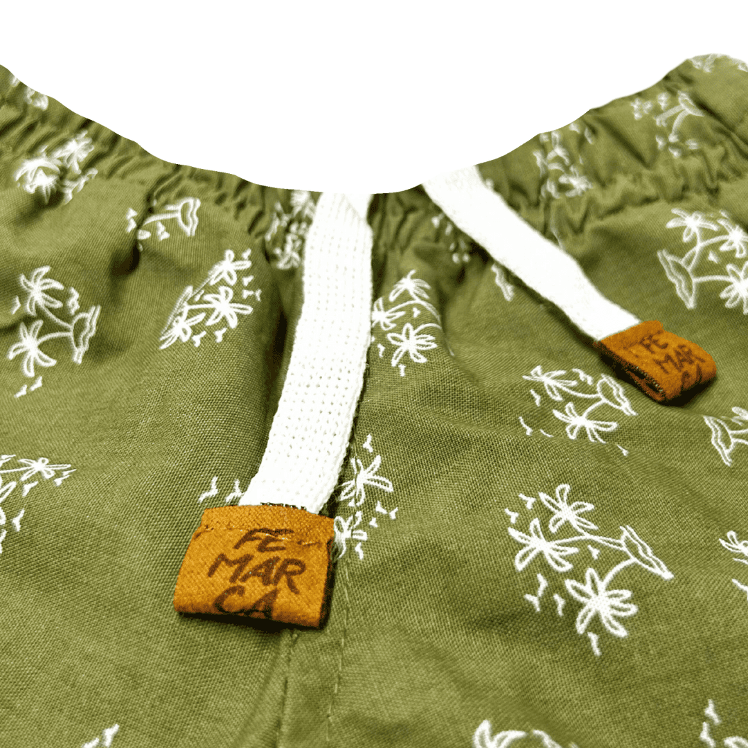 OUT|Short Niña Palmeras fondo verde