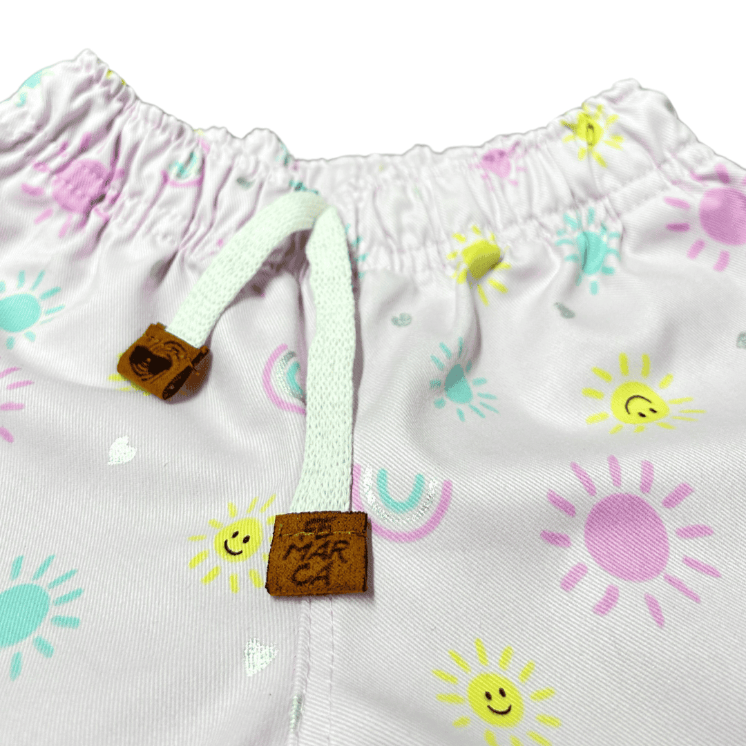 Short Niña soles y caritas rosados