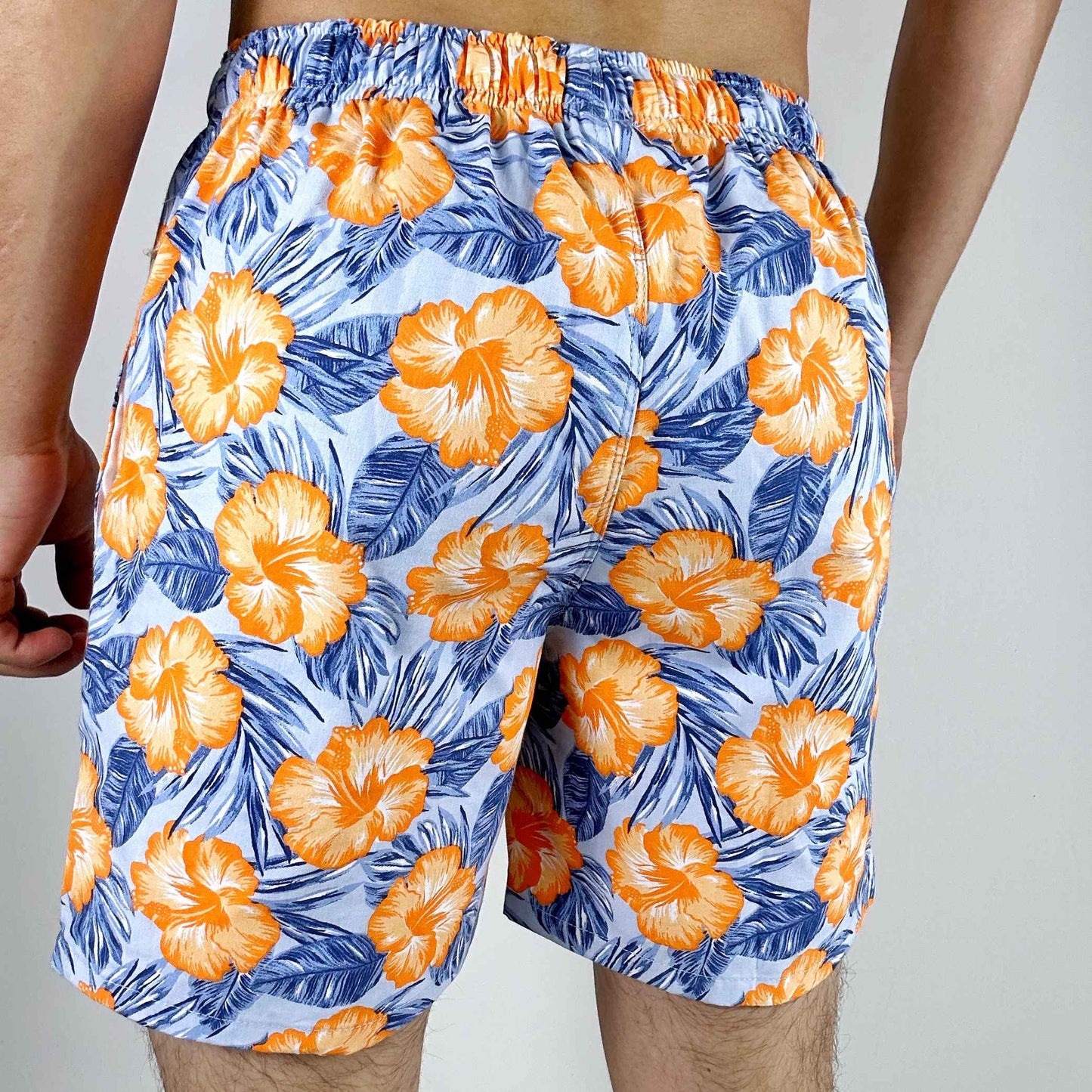 OUT Pantaloneta Hombre Flores Naranjas
