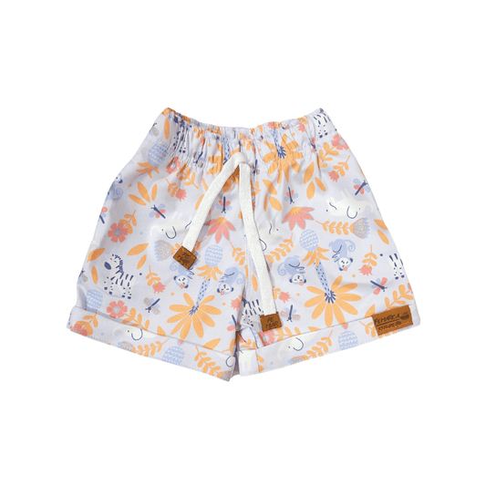 OUT|Short Niña Flores tono Naranja fondo lila